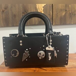 Coach Rogue 26 with Rivets